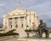 An image of the historic Essex County Courthouse in Newark, New Jersey.  In the foreground is The Seated Lincoln, sculpted by Gutzon Borglum and dedicated by Theodore Roosevelt in 1911.  Designed by Cass Gilbert, the Newark courthouse was constructed in 1907.  The marble Essex County Courthouse, a Beaux-Arts structure, is listed on the National Register of Historic Places.  The courthouse was rededicated in 2004 after a $50 million restoration led by Farewell Mills Gatsch Architects.  A newer Essex County Courthouse was built nearby in 1970.  This image © Capitolshots Photography/TwoFiftyFour Photos, LLC, ALL RIGHTS RESERVED.