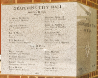 An image of the cornerstone of Grapevine City Hall in Grapevine, Texas.  The brick structure was built in 1997.  Grapevine City Hall is topped by The Grapevine Nightwatchman, created by Jack Bryant and dedicated in 1998.  This stock photo Copyright Capitolshots Photography, ALL RIGHTS RESERVED.