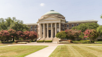 A photo of Dallas Hall on the campus of Southern Methodist University in University Park, Texas.  Designed by Shepley, Rutan And Coolidge in a manner similar to The Rotunda at the University of Virginia, the brick Classical Revival structure opened in 1915 and remains the centerpiece of the SMU campus to this day.  Dallas Hall is listed on the National Register of Historic Places and is a Texas Historic Landmark.  This stock image Copyright Capitolshots Photography, ALL RIGHTS RESERVED.