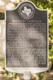 A photo of a historical marker on the grounds of the Real County Courthouse in Leakey, Texas.  Designed by H.A. Reuter, the Leakey courthouse was completed in 1918.  The Real County Courthouse, a Classical Revival structure, is a Texas Historic Landmark.  This stock image Copyright Capitolshots Photography, ALL RIGHTS RESERVED.