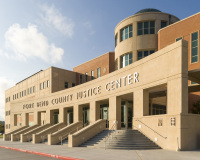 A photo of the Fort Bend County Justice Center in Richmond, Texas.  The Richmond courthouse, the county's fifth, was designed by PGAL.  The Fort Bend County courthouse was dedicated in 2011.  This photo © Capitolshots Photography/TwoFiftyFour Photos, LLC, ALL RIGHTS RESERVED.