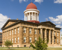 A photo of the Illinois Old State Capitol in Springfield.  Designed by John F. Rague and constructed between 1837 and 1840, the Greek Revival structure served as the capitol of Illinois from 1840 until 1876, when the current capitol building was completed.  The building then served as the Sangamon County Courthouse from 1876 through 1966, when the county retroceded the building back to the state.  The building was completely reconstructed in the 1960s and restored to its 1860 appearance.  The Illinois Old State Capitol is a National Historic Landmark.  This photo © Capitolshots Photography/TwoFiftyFour Photos, LLC, ALL RIGHTS RESERVED.