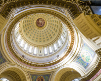 A photo inside the rotunda of the the Wisconsin State Capitol.  The Beaux-Arts structure was constructed in Madison between 1906 and 1917.  The Wisconsin State Capitol, designed by George B. Post, is a National Historic Landmark.  This photo © Capitolshots Photography/TwoFiftyFour Photos, LLC, ALL RIGHTS RESERVED.