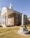A photo of the Lancaster County Courthouse in Lancaster, Virginia.  In the foreground is a memorial dedicated to the men and women of Lancaster County who served their country in time of war.  The Lancaster courthouse was designed by Edward O. Robinson.  Completed in 1861, the Lancaster County Courthouse, a brick Classical Revival structure and the last courthouse completed in Virginia before the Civil War, is part of the Lancaster Court House Historic District, which is listed on the National Register of Historic Places.  This stock image Copyright Capitolshots Photography, ALL RIGHTS RESERVED.