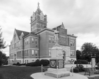 An image of the Marion County Courthouse in Palmyra, Missouri.  In the foreground is a memorial dedicated in 1907 to the Confederate veterans of Marion County.  Marion County also has a courthouse in Hannibal, although Palmyra is the county seat.  The Palmyra courthouse was designed by William N. Bowman.  The Marion County Courthouse, a brick Romanesque Revival structure, was built in 1901.  This stock photo Copyright Capitolshots Photography, ALL RIGHTS RESERVED.