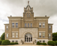 A photo of the Marion County Courthouse in Palmyra, Missouri.  Marion County also has a courthouse in Hannibal, although Palmyra is the county seat.  The Palmyra courthouse was designed by William N. Bowman.  The Marion County Courthouse, a brick Romanesque Revival structure, was built in 1901.  This stock image Copyright Capitolshots Photography, ALL RIGHTS RESERVED.