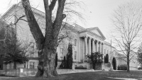 An image of the Montgomery County Courthouse in Rockville, Maryland.  Completed in 1931, the granite Rockville courthouse, a Classical Revival structure, was designed by Delos H. Smith and Thomas R. Edwards.  The courthouse stands immediately to the west of its 1891 predecessor.  Both buildings are part of the Montgomery County Courthouse Historic District, which is listed on the National Register of Historic Places.  This stock photo Copyright Capitolshots Photography, ALL RIGHTS RESERVED.